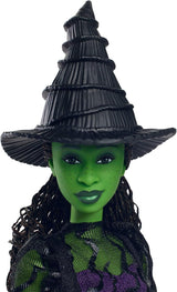 Mattel Wicked Elphaba Modepuppe und Zubehör mit grüner Haut, schwarzem geflochtenem Haar, verschiedenen möglichen Posen und abnehmbarem Ballkleid-Aussehen, HXT62, [Mehrfarbig]