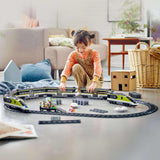 LEGO City Personen-Expresszug, ferngesteuertes Zugset, Eisenbahnspielzeug mit Scheinwerfern, 2 Waggons und 24 Gleiselementen, Geschenk für Kinder, Jungen und Mädchen 60337 Bausets Besuchen Sie den LEGO-Store