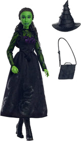 Mattel Wicked Elphaba Modepuppe und Zubehör mit grüner Haut, schwarzem geflochtenem Haar, verschiedenen möglichen Posen und abnehmbarem Ballkleid-Aussehen, HXT62, [Mehrfarbig]