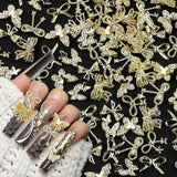 50 Stück 3D Gold Bow Nail Charms Butterfly Nail Art Charms Legierung Bogen Nagel Charms Nägel Zubehör Schleife Nagelschmuck Metall Schleifen Schmetterling Nageldesign Nagelanhänger Nailart Strasssteine