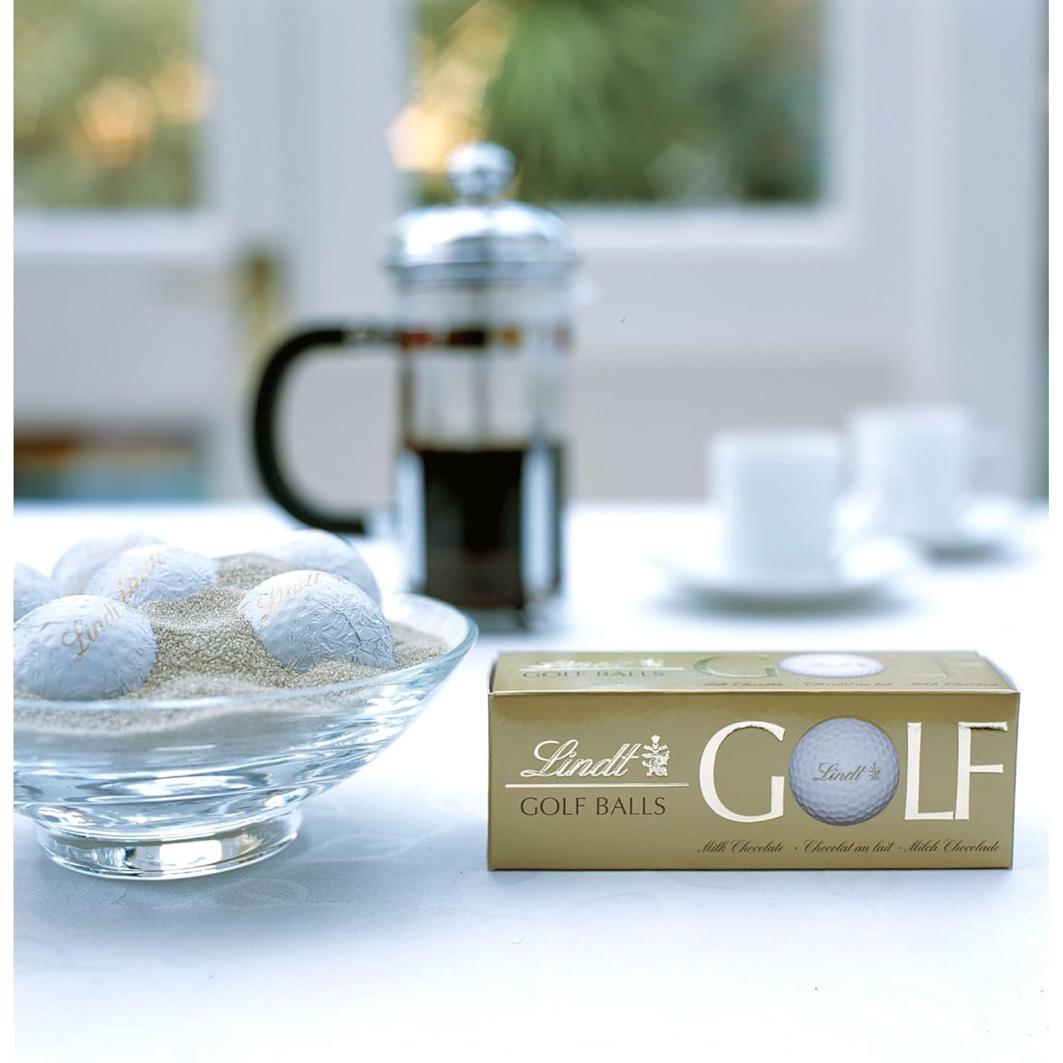 Lindt Schokolade - Golfbälle | 110 G| Drei Golfbälle Aus Lindt Vollmilch-Schokolade Mit Nougatcremefüllung Und Waffelstückchen | Pralinengeschenk | Geschenk für Golfer | Schokoladengeschenk Naty Shop
