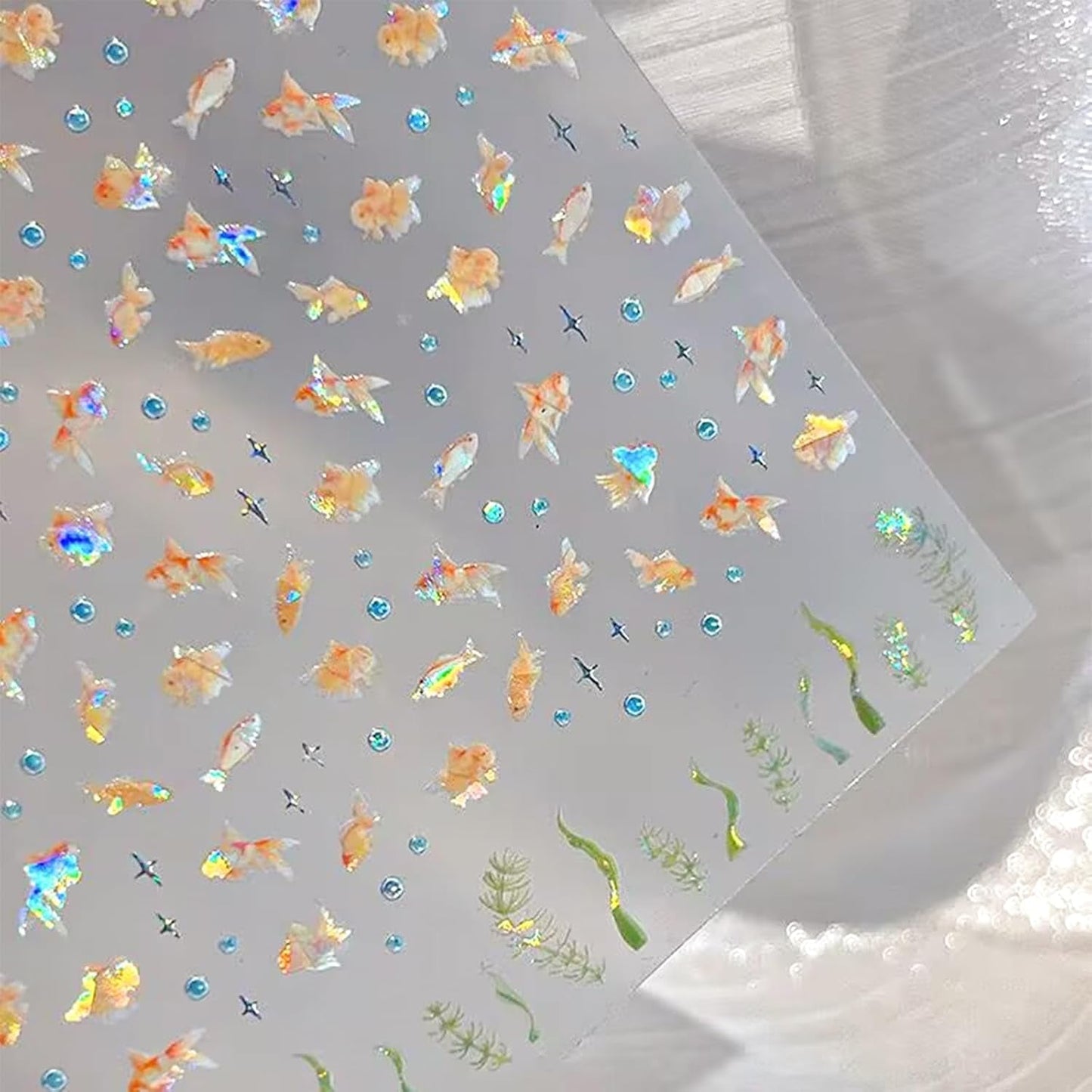2 Stück selbstklebende Nagelsticker mit Muscheleffekt, Vierstrahlstern und Goldfisch-Design, Nagelaufkleber für Fingernägel, Nail Art Zubehör für Gelnägel