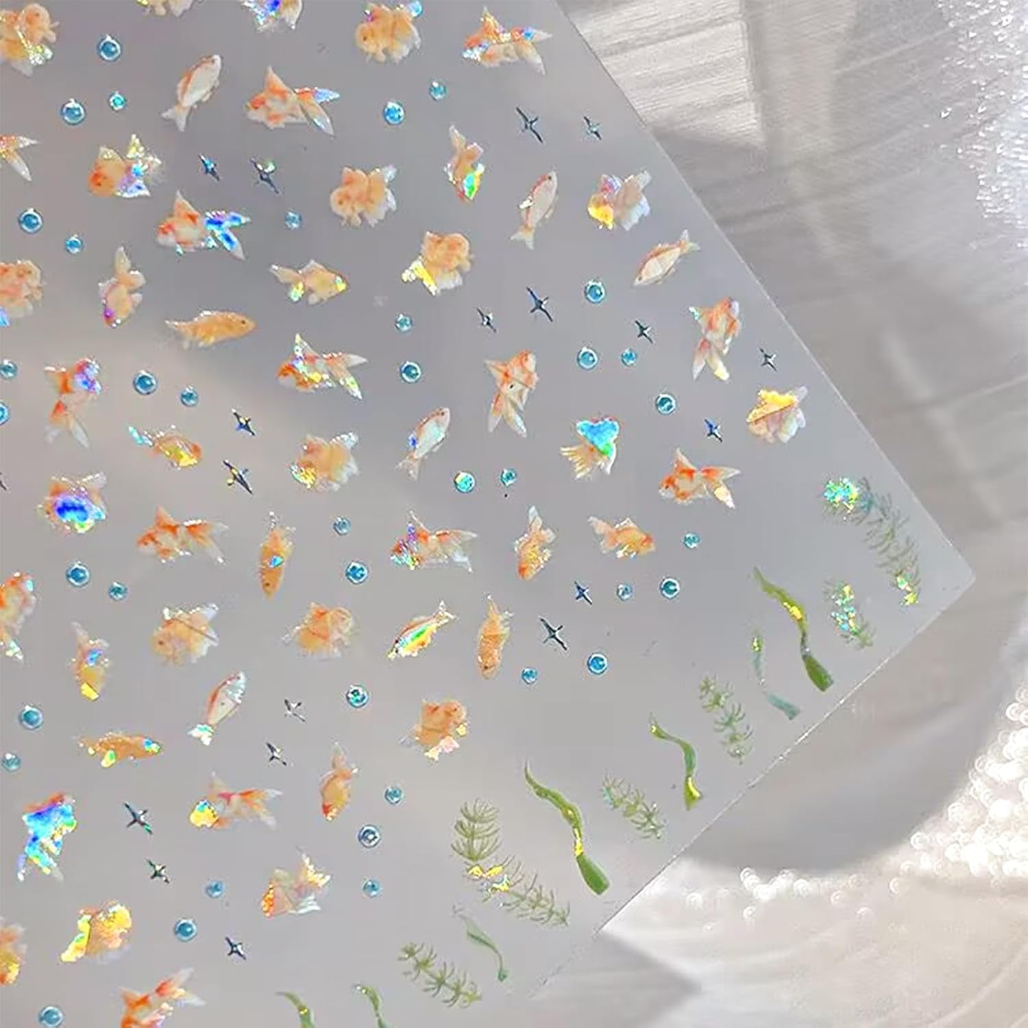 2 Stück selbstklebende Nagelsticker mit Muscheleffekt, Vierstrahlstern und Goldfisch-Design, Nagelaufkleber für Fingernägel, Nail Art Zubehör für Gelnägel