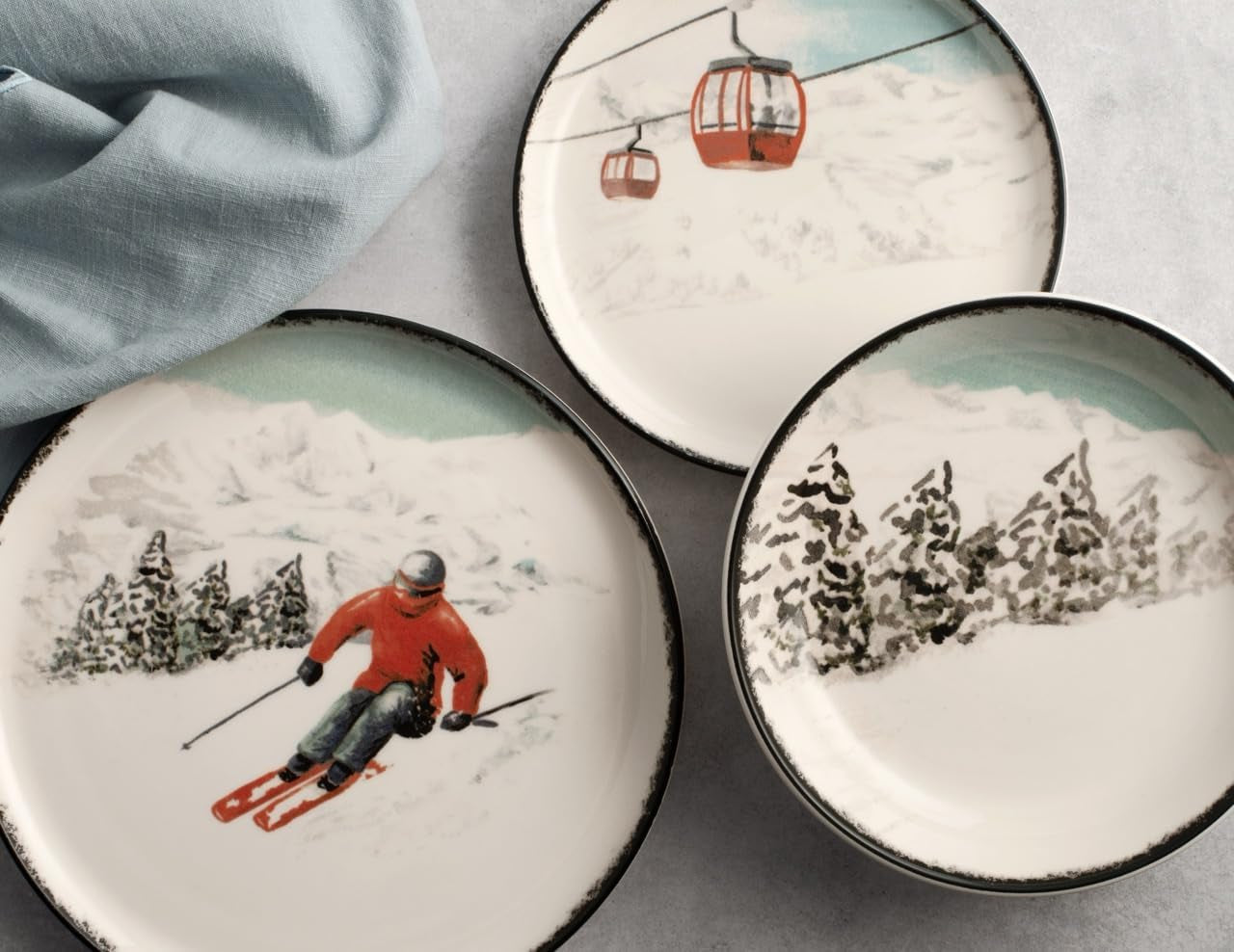 Winter Escape 12-teiliges Weihnachtsgeschirr-Set aus Steinzeug – nordisches Winter-Skifahrer-Design – spülmaschinen- und mikrowellenfest