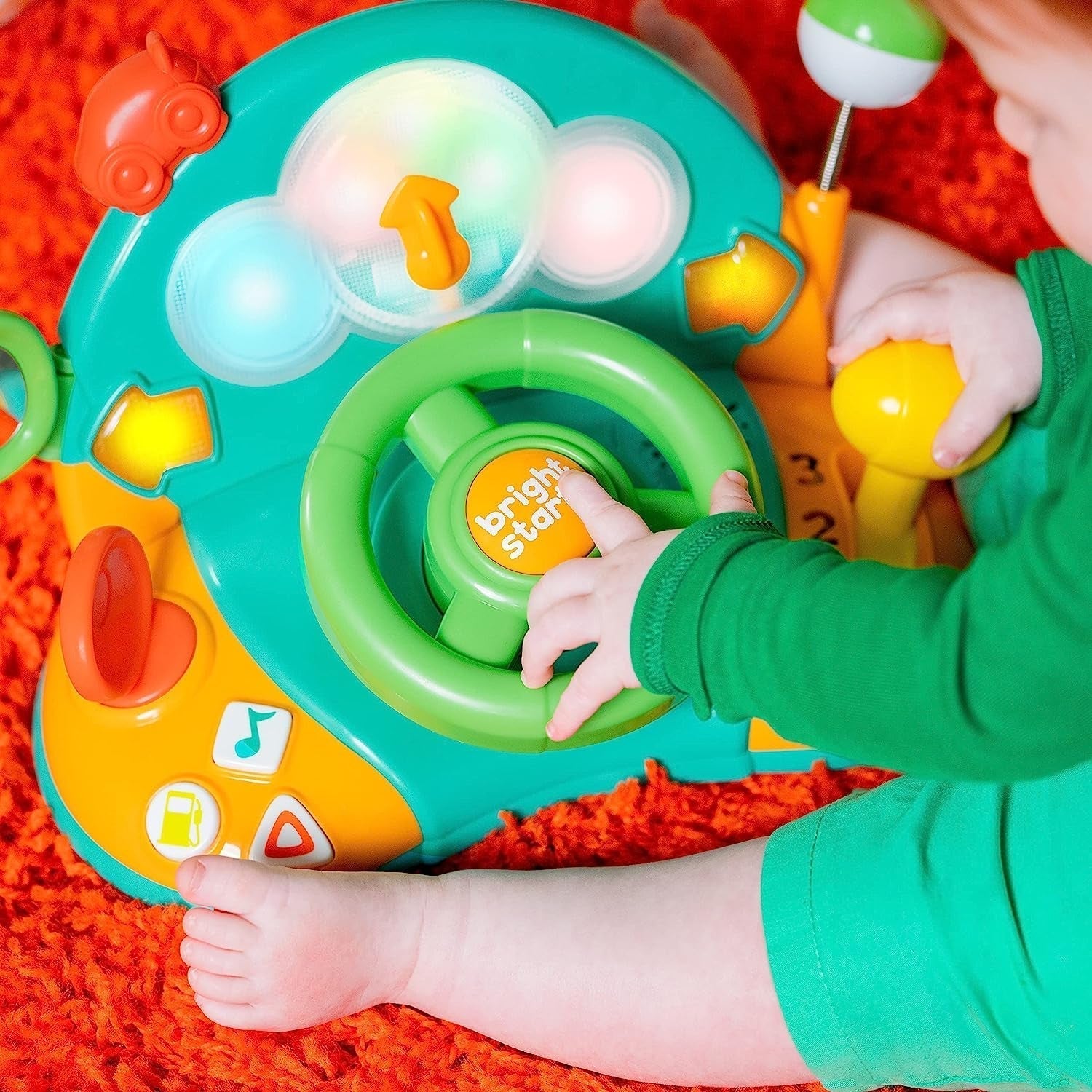 Bright Starts, Spielzeuglenkrad, Lights & Colors Driver, mit Musik, Autogeräuschen, Blinkern, Schalthebel und mehr Bebe Naty Shop Toys