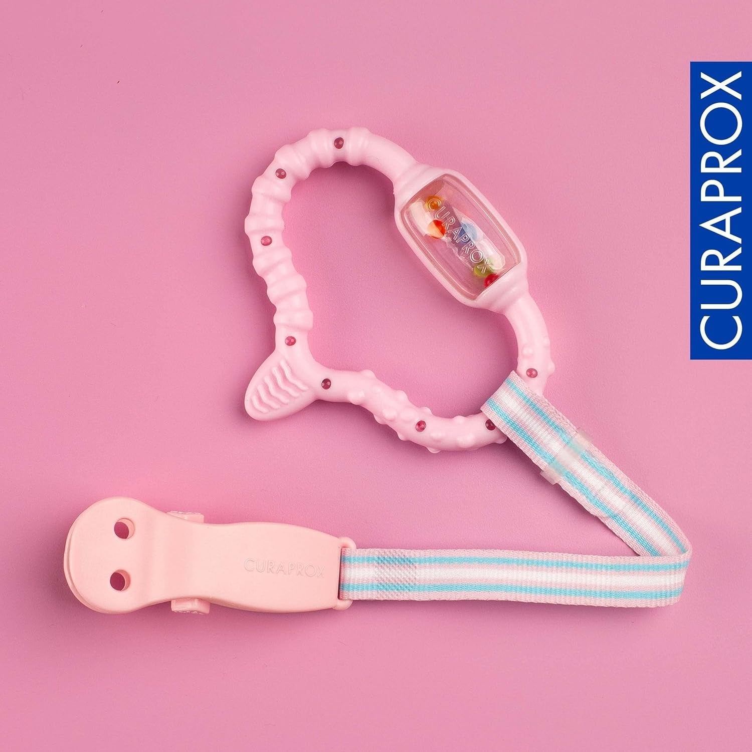 Curaprox Beißring für Babys - Für Kleinkinder 0-24 Monate / Lindert Zahnungsschmerzen und fördert motorische Fähigkeiten | BPA-frei, rosa, mit Trainingszahnbürste / Hergestellt in der Schweiz