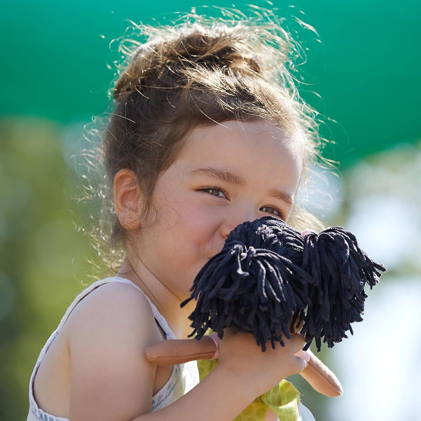 HABA 304576 - Cari-Puppe, 30 cm, Kuschel- und Stoffpuppe für Kinder ab 18 Monaten, mit abnehmbarer Kleidung und langen Haaren