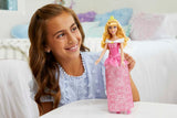 Mattel DISNEY Prinzessin Aurora – Puppe mit typischem Outfit, abnehmbaren Schuhen und Tiara, glitzerndem Oberteil und abnehmbarem gemustertem Rock, langes stylebares Haar, HLW09 Naty Shop Dolls