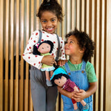 HABA 304576 - Cari-Puppe, 30 cm, Kuschel- und Stoffpuppe für Kinder ab 18 Monaten, mit abnehmbarer Kleidung und langen Haaren